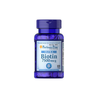 A bottle of Puritan’s Pride Ultra Biotin 7500 mcg, 100 tablets, a vegetarian vitamin B7 supplement for healthy hair, skin, and nails.